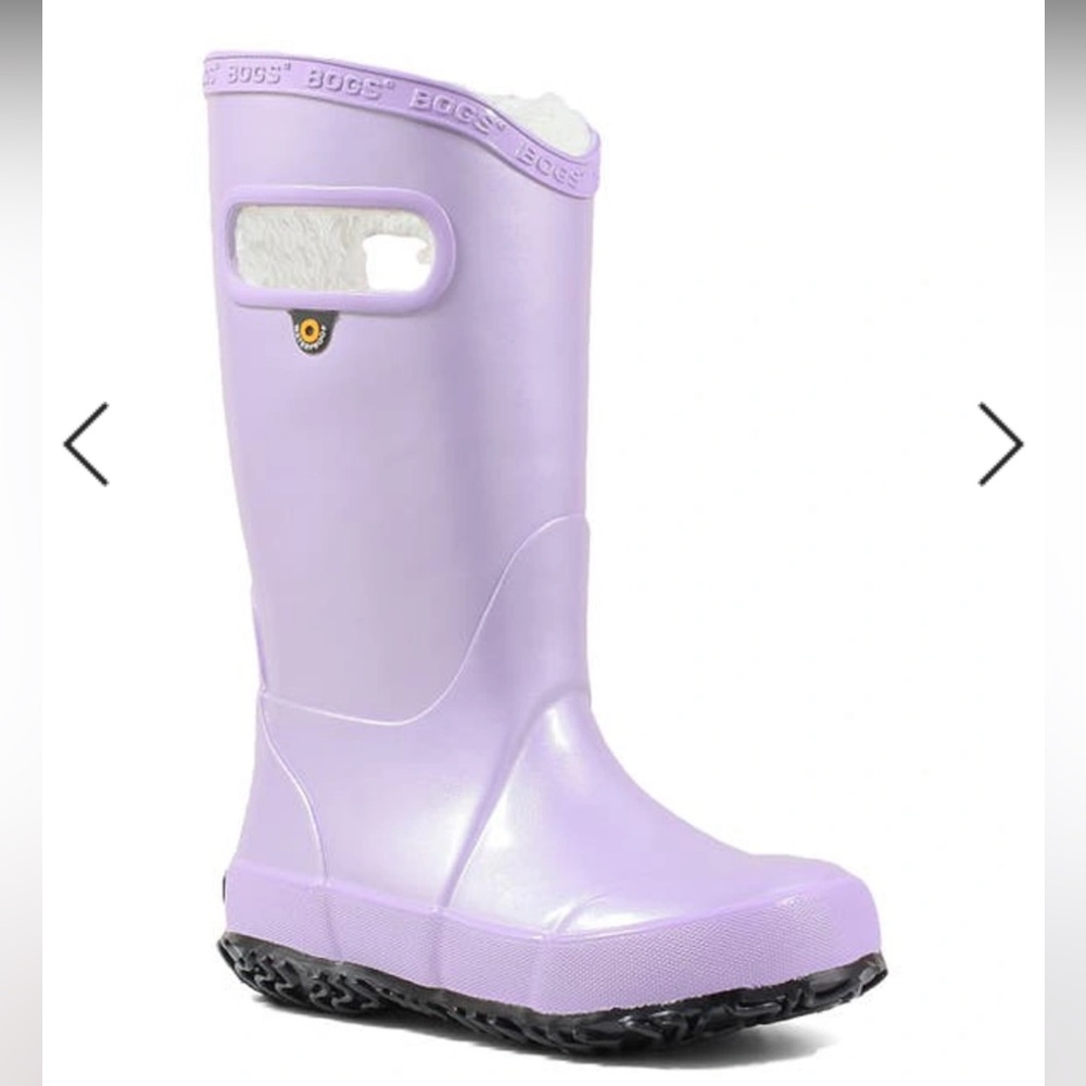 A shimmery waterproof boot features a cozy plush lining.